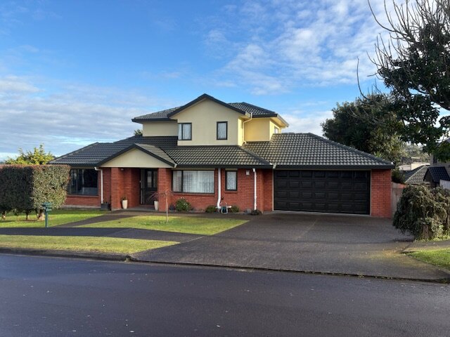 Completed Roofcare concrete tile roof in Karaka on a brick and plaster Auckland home