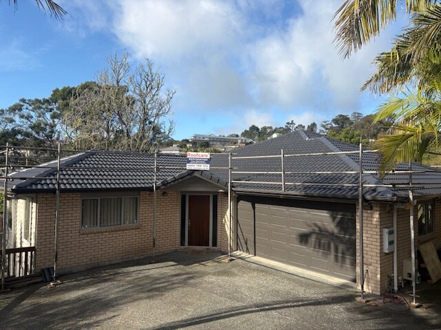 Completed Roofcare concrete tile roof in Piha Slate on an Auckland home