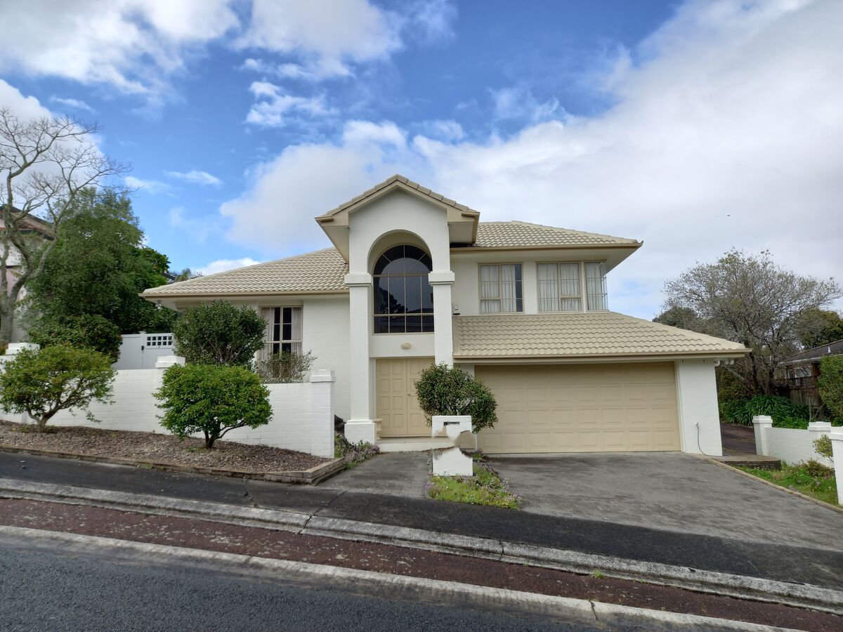 Completed Roofcare roof in Desert Sand on a two storey Auckland home