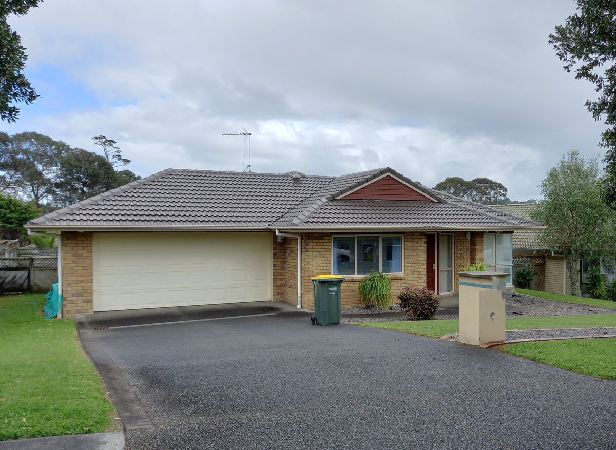 Completed Roofcare concrete tile roof in Mission Brown on an Auckland home