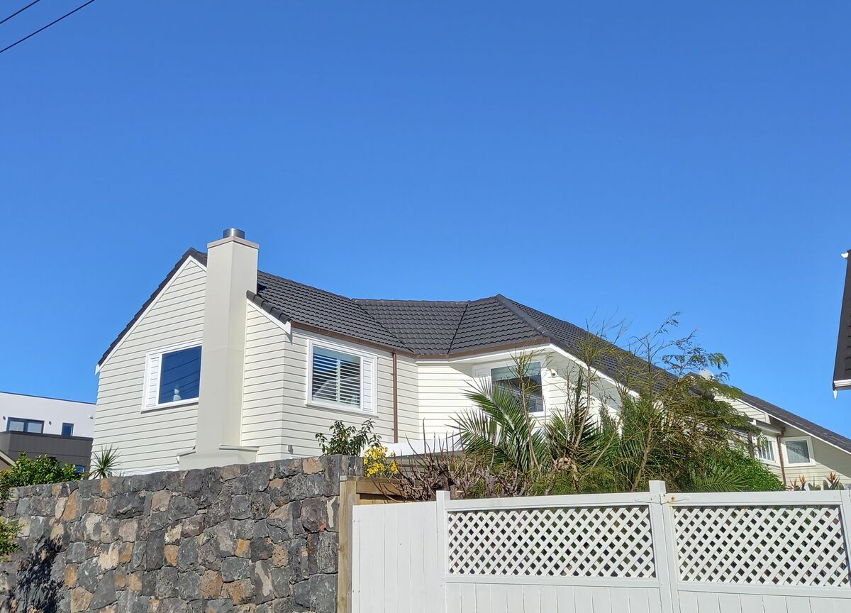 Completed Roofcare roof in Piha Slate on a two storey Auckland home